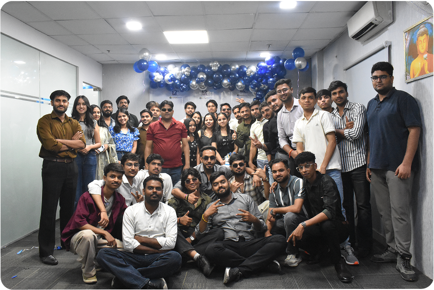 OutRight Systems team gathered together in the office