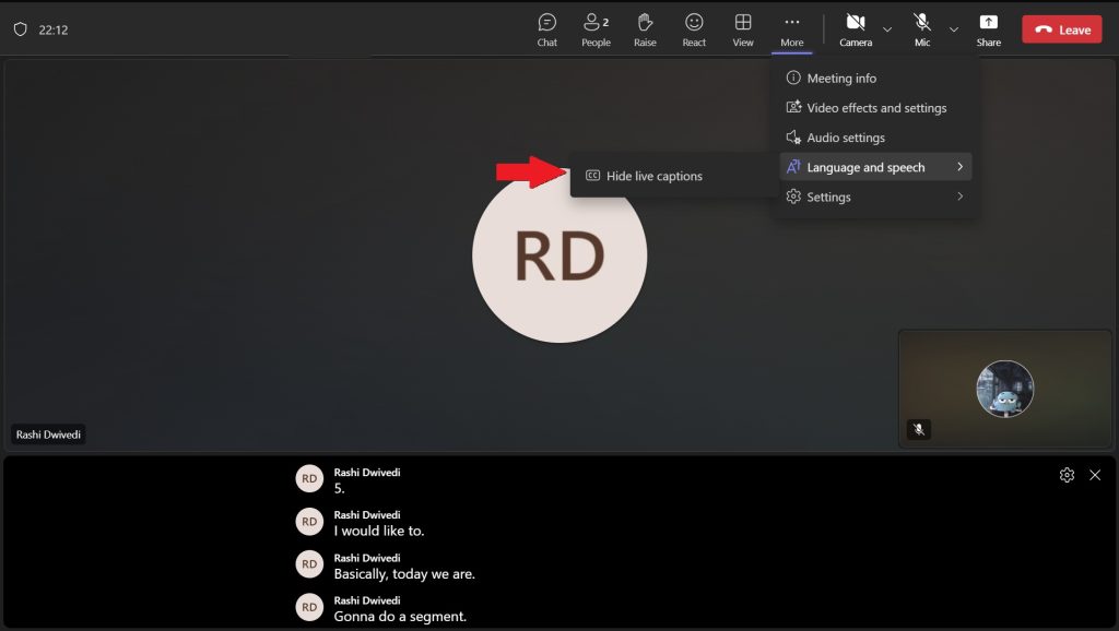 Screenshot of Microsoft Teams meeting showing the option to hide live captions under language and speech settings, with captions displayed at the bottom.